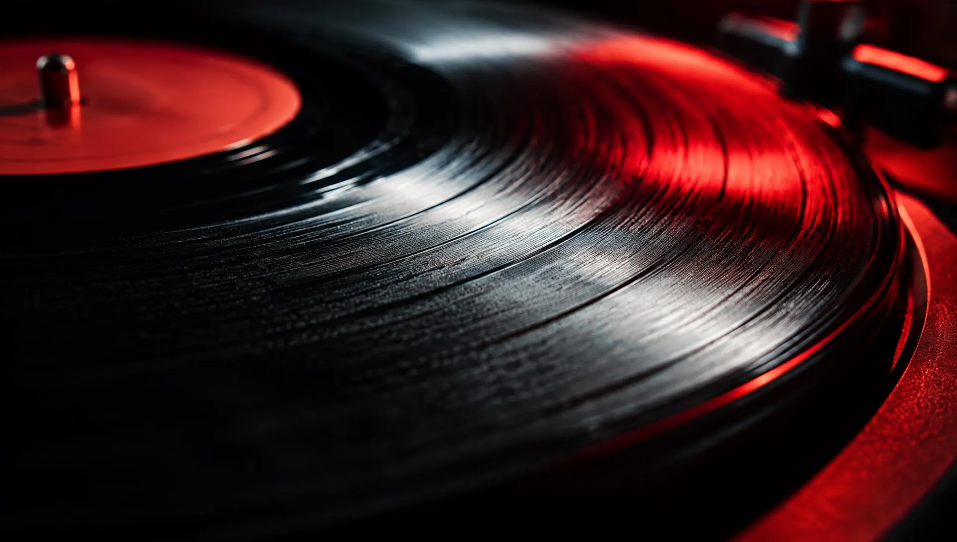 Sulcos de um disco de vinil iluminados em vermelho